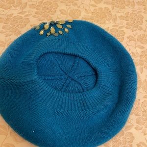 Mary Kay turquoise hat w/ rhinestones in front of hat. Acrylic.No tags.O…